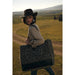 This Myra Carmela Weekender Bag brings together vintage Western charm and practical travel style