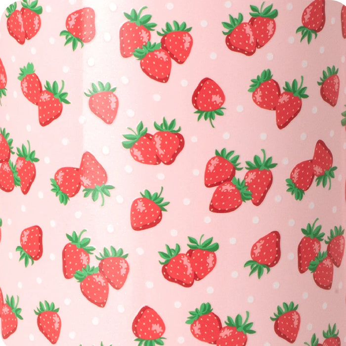 A stylish tumbler containing strawberry wine, featuring a bright pink hue and a modern, insulated design.