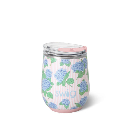 A wine glass featuring a delicate pink and blue floral design, elegantly showcasing its artistic craftsmanship.