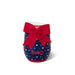 A wine glass adorned with a red bow and scattered stars, creating a festive and elegant appearance.
