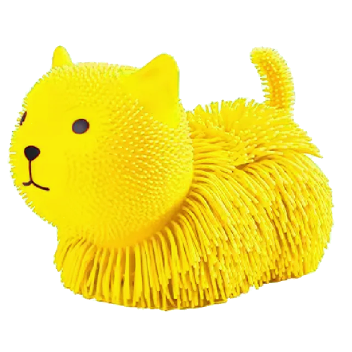 Yellow cat-shaped sponge with textured surface on a white background