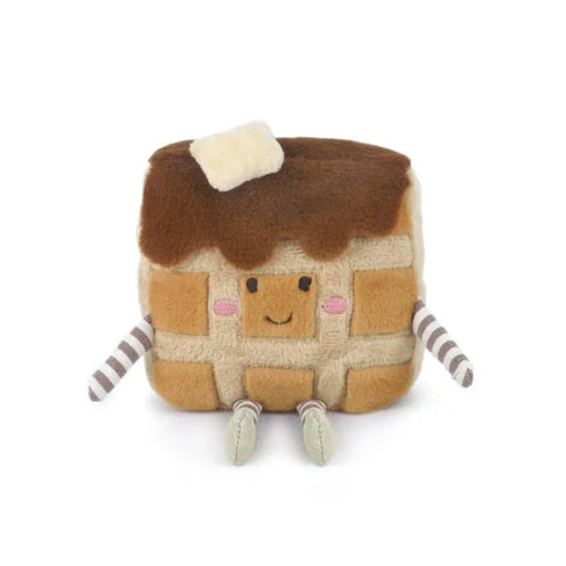Plush toy resembling a grilled cheese sandwich with a face on a white background