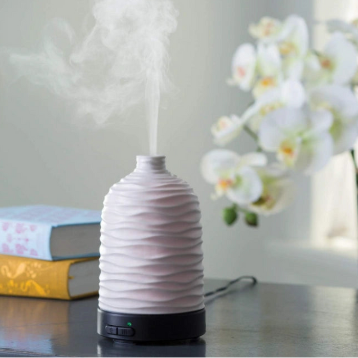 This Candle Warmers Airome Harmony Medium ultrasonic Essential Oil Diffuser releases a fine, cool mist that carries your favorite essential oils throughout your space. 
