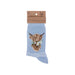 A set of blue socks showcasing a cute cow illustration.