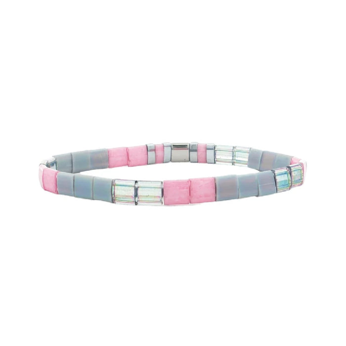 A stylish bracelet made of square glass beads in shades of pink and blue, showcasing a vibrant design.