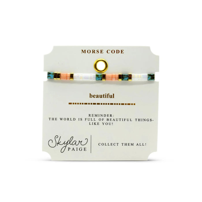 Elegant bracelet with a mix of colors, crafted from gold and white enamel for a stylish look.