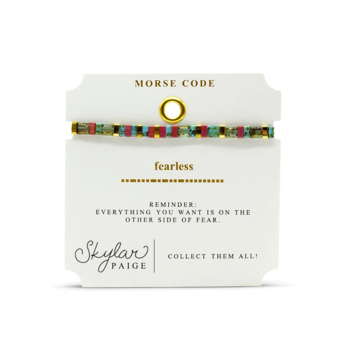 A colorful bracelet crafted from gold and turquoise, highlighting a unique and eye-catching accessory.