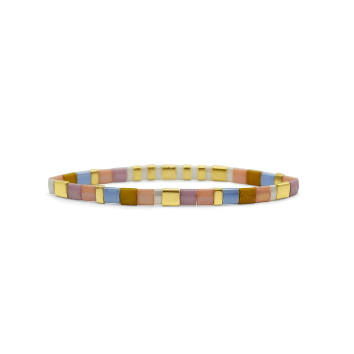 A multi-colored bracelet crafted from gold and glass, showcasing a vibrant design and elegant materials.