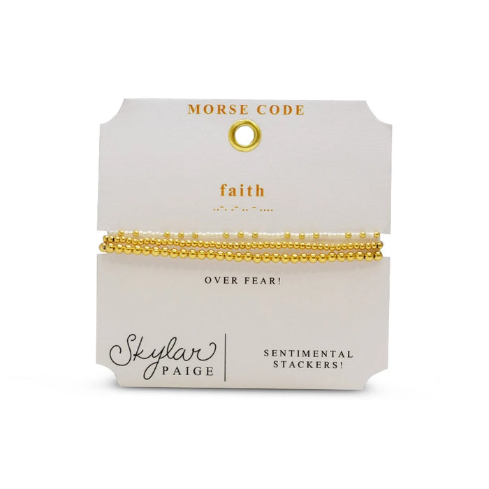 An elegant bracelet made of white and gold beads, perfect for adding a touch of sophistication to any outfit.