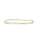 A white and gold bracelet adorned with decorative beads, showcasing an elegant and stylish design.