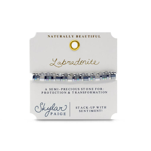 A chic bracelet composed of white and black stones, creating a sophisticated and eye-catching accessory.