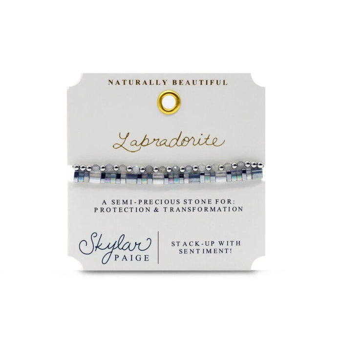 A chic bracelet composed of white and black stones, creating a sophisticated and eye-catching accessory.