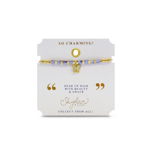 A stylish gold bracelet adorned with a tiny diamond charm, perfect for adding a touch of elegance to any outfit.