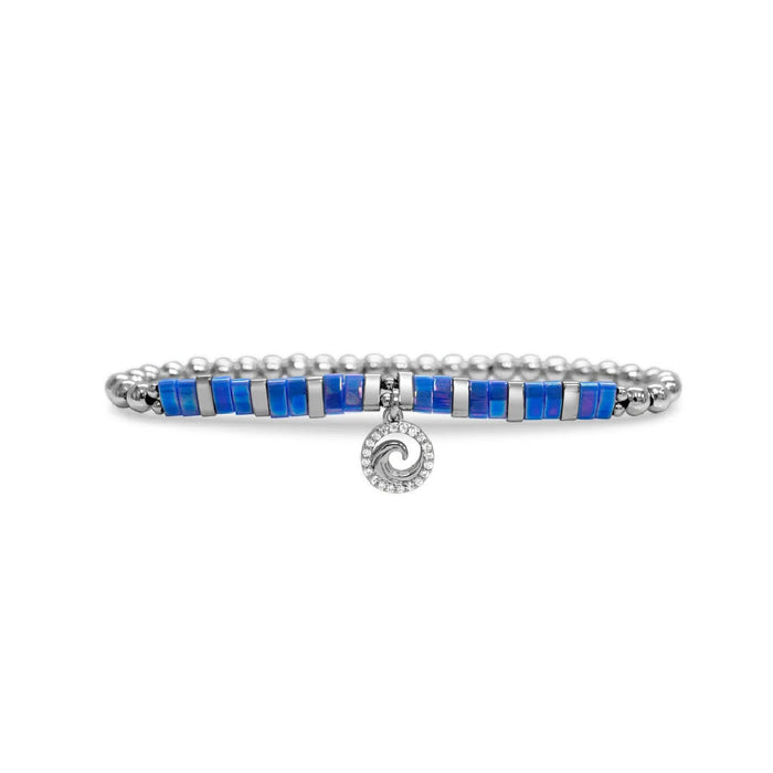 A bracelet featuring blue stones and a silver charm, elegantly designed for a stylish accessory.