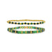  Two bracelets featuring green and gold beads arranged in a decorative pattern.
