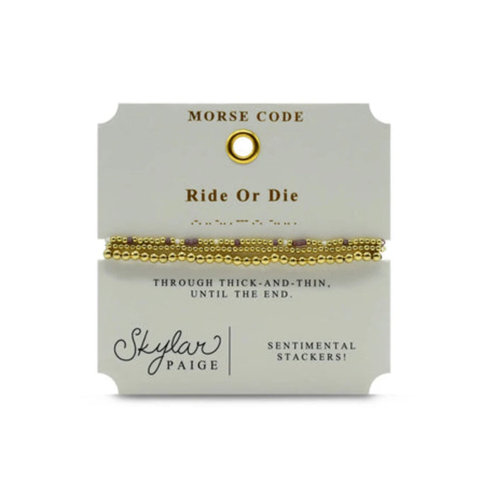 Elegant bracelet crafted from gold and white beads, showcasing a stylish beaded pattern.