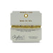 Elegant bracelet crafted from gold and white beads, showcasing a stylish beaded pattern.