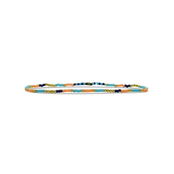 A bracelet adorned with an array of colorful beads in various shapes and sizes.
