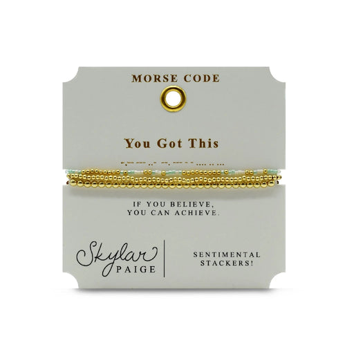 Elegant bracelet made of gold and green beads, highlighted by a central gold bead.