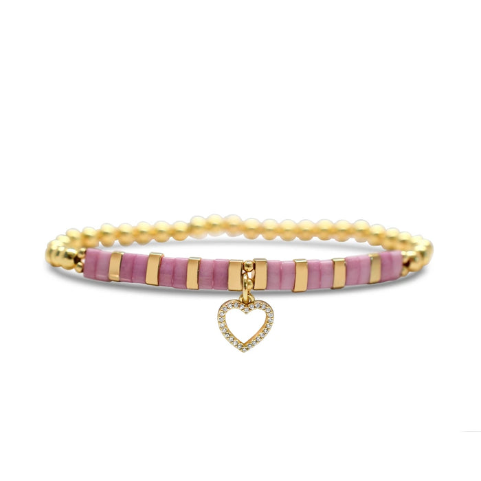 A pink bracelet featuring a heart charm, elegantly designed for a stylish accessory.