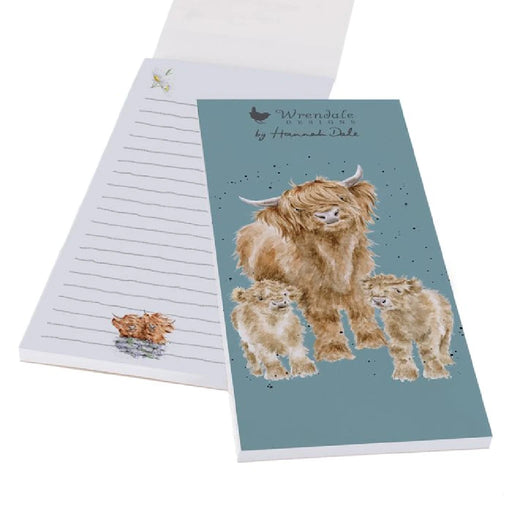 A notepad featuring an illustration of a cow alongside two playful kittens.