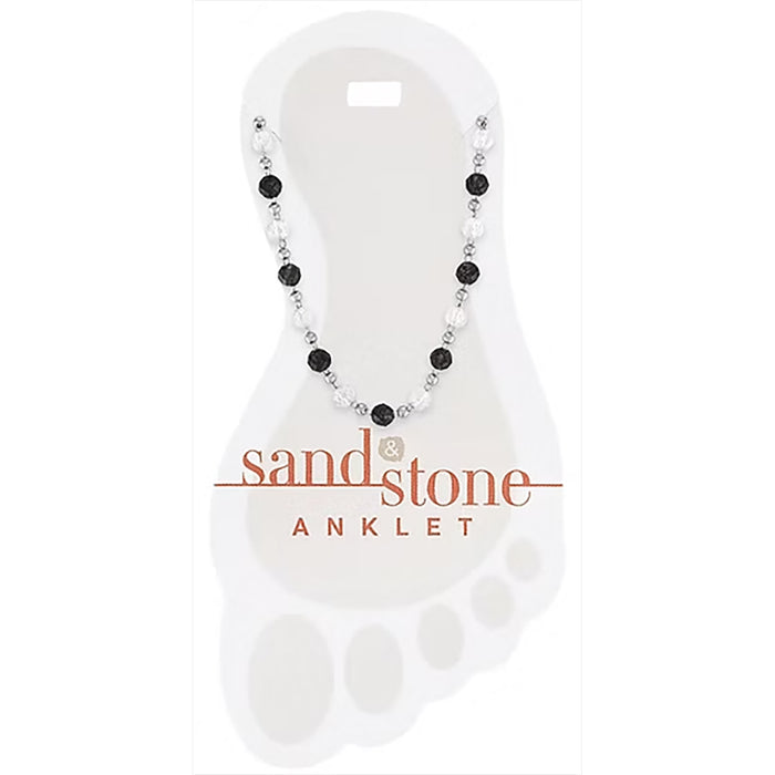 Beaded anklet on a white card with 'sand & stone' branding