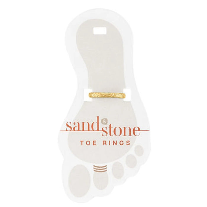 A pair of sandstone toe rings alongside a gold ring, showcasing a blend of natural and elegant jewelry styles.