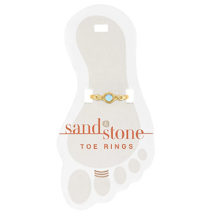 A decorative toe ring made of sand stone, adorned with a striking gold and blue gemstone.