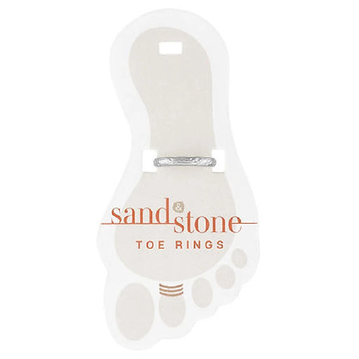 Sandstone toe rings arranged in a sleek white box, emphasizing their distinctive patterns and natural beauty.