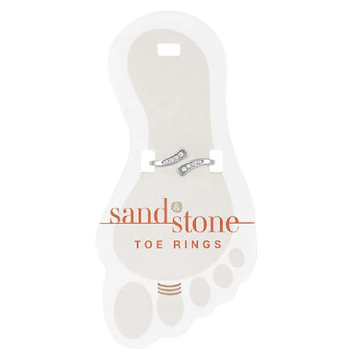A collection of sandstone toe rings nestled in pristine white packaging, highlighting their earthy tones and craftsmanship.