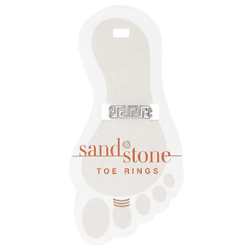 A collection of silver-accented sandstone toe rings arranged artistically.
