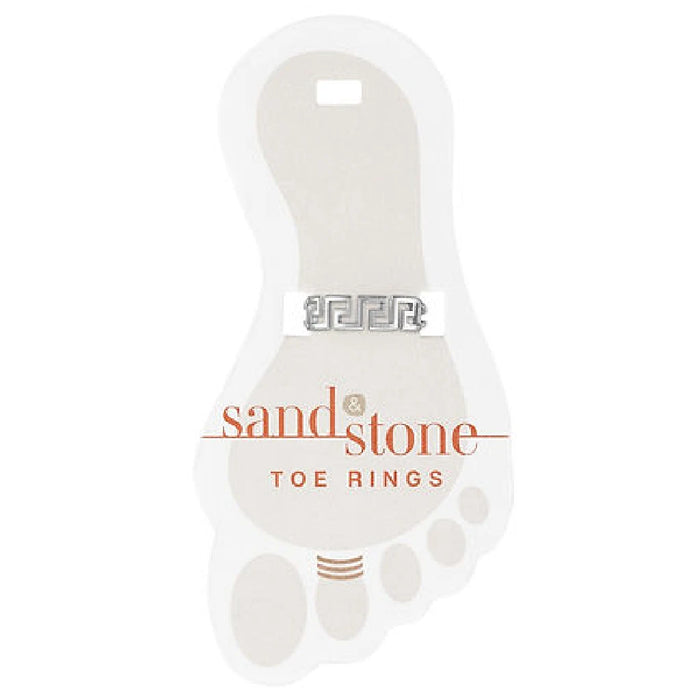 A collection of silver-accented sandstone toe rings arranged artistically.
