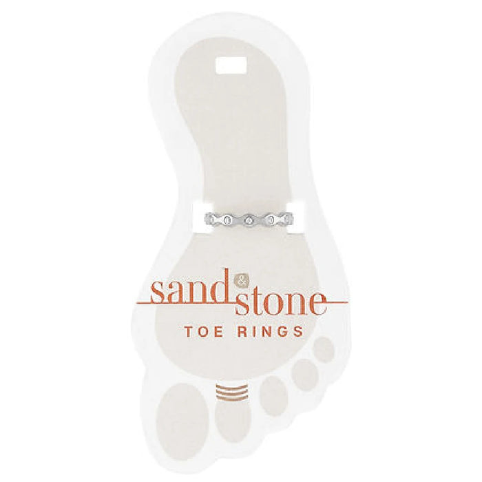 A pair of silver-accented sandstone toe rings showcased elegantly.