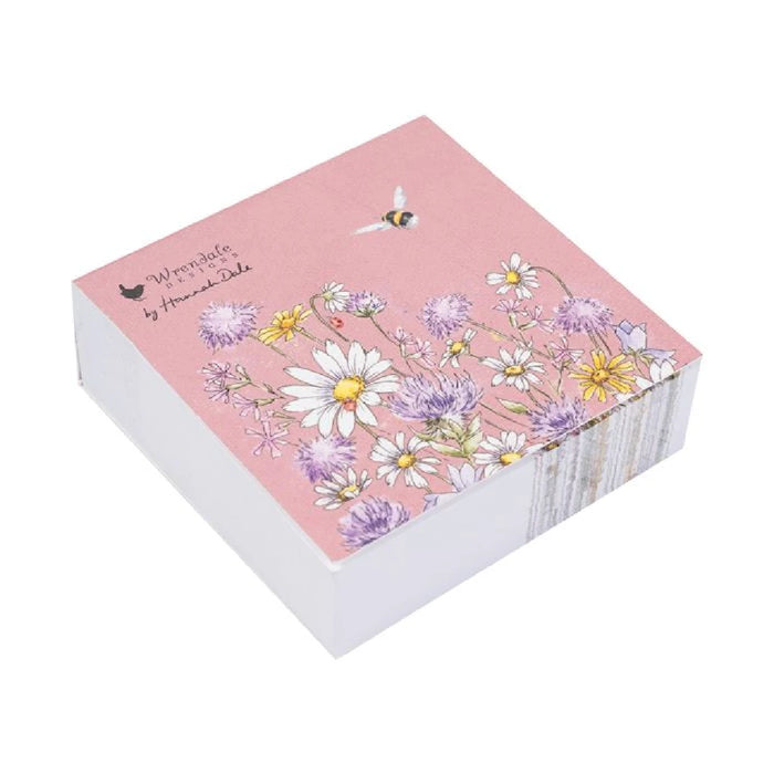 A pink notebook adorned with daisies and bees, showcasing a cheerful and vibrant design.