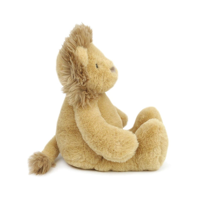 Plush lion toy on a white background