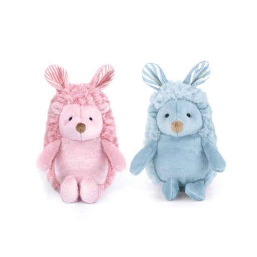 Two plush hedgehogs with striped bunny ears, one pink and one blue, sitting side by side on a white background