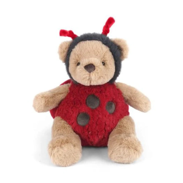 A stuffed ladybug adorned in a black and red dress, highlighting its charming design and cuddly appearance.