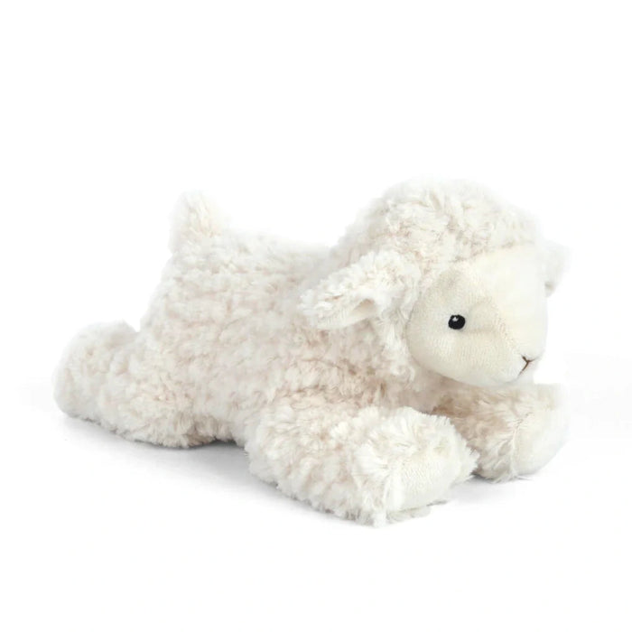 Fluffy plush fabric, sweet facial features, and relaxed laying pose