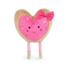 A soft pink heart-shaped stuffed toy featuring a bow, conveying a sense of love and comfort.