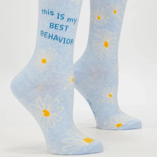 Light blue socks with daisy flowers and text on a white background