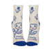 Pair of socks with floral design and 'Pretty Anxious' text on a white background