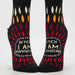 Pair of socks with colorful patterns and text on a white background