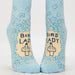 Light blue socks with floral patterns and 'Bird Lady' text on a white background