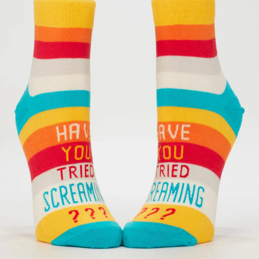Colorful socks with text on a white background