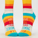Colorful socks with text on a white background