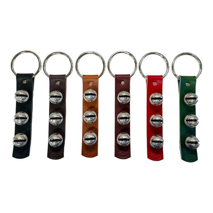 Set of six keychains with leather straps and metal bells in black, brown, red, and green.