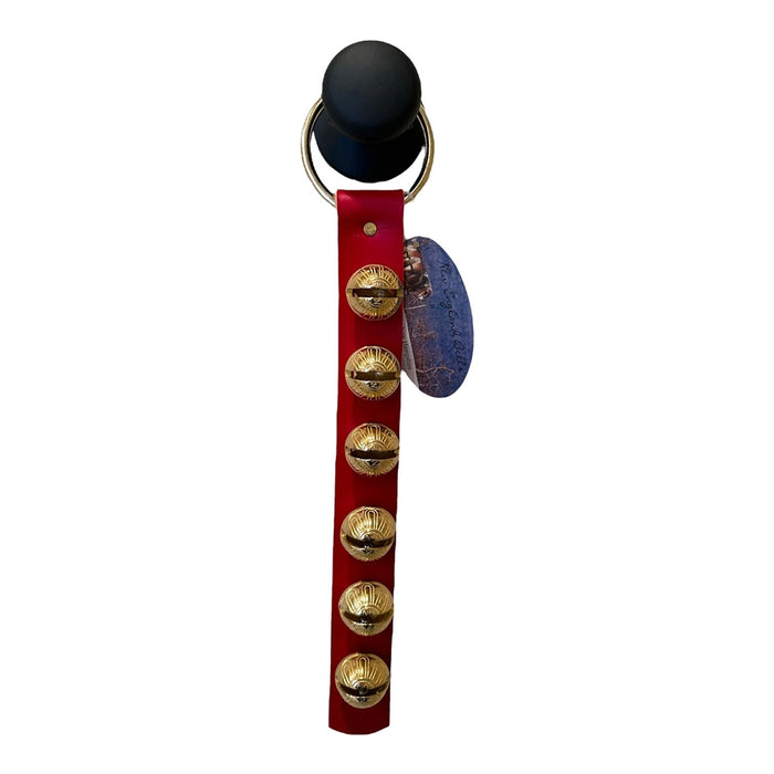 Red bell with gold accents on a white background