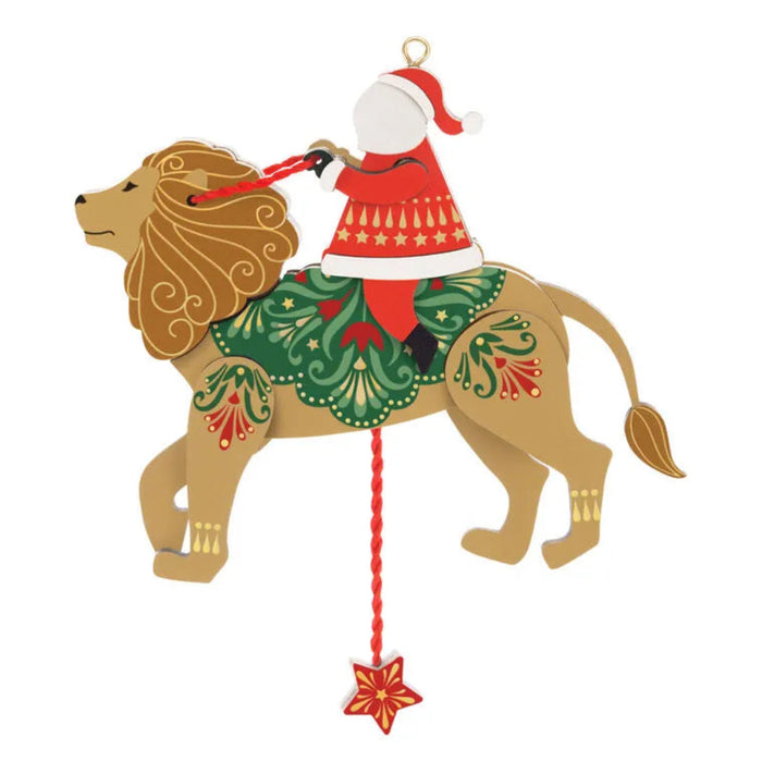 Decorative Christmas ornament with a lion and person in Santa attire on a white background