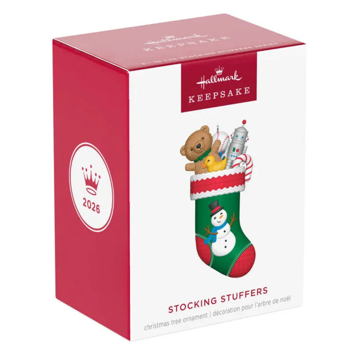 Hallmark 2026 Stocking Stuffers Christmas ornament box front featuring snowman on red green stocking with toys