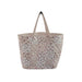 A pink and white floral tote bag featuring a vibrant flower pattern on a sturdy fabric.